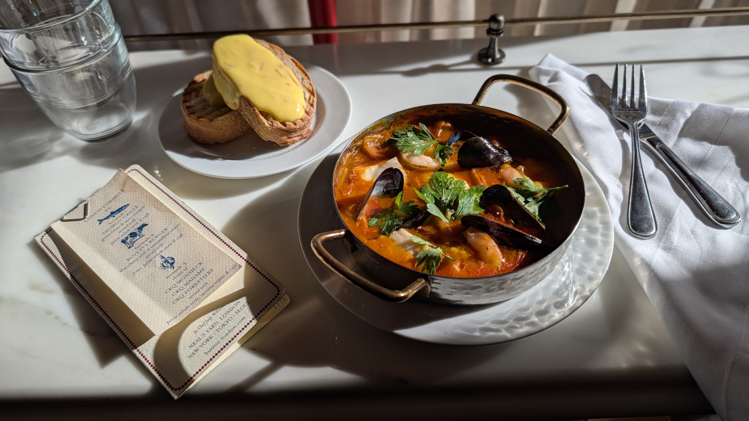 Mussels in a pan, served at the table