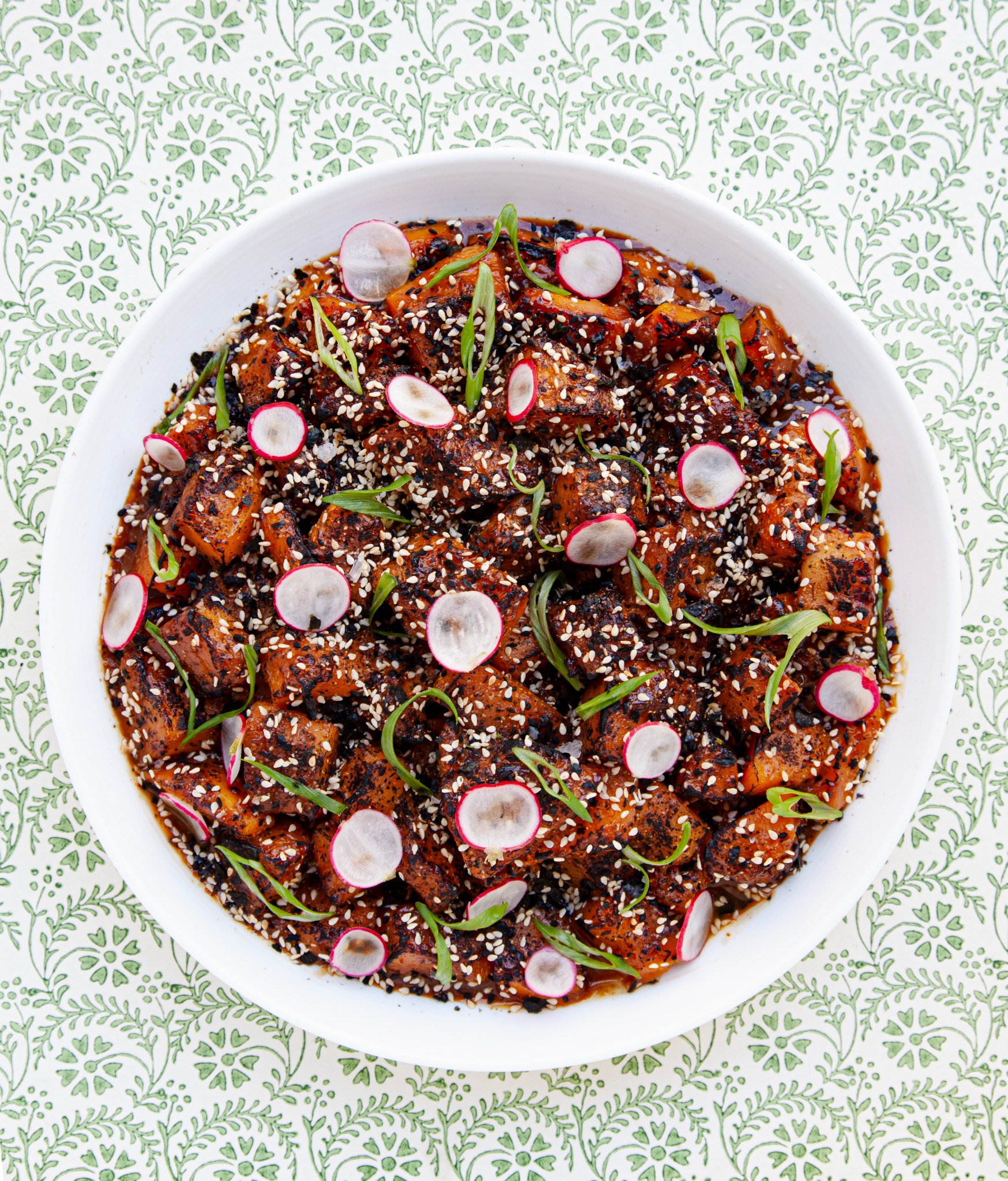 Glazed sweet potato, sesame and radish